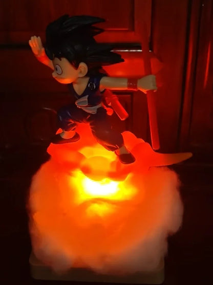 Sangohan vole sur nuage magique lumineux bâton rouge main